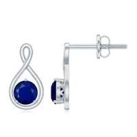 Round cut blue sapphire solitaire infinity stud earrings in 3/4 carat from Rosec Jewels, featuring sparkling blue sapphires and silver settings.