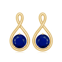Round cut blue sapphire solitaire infinity stud earrings by Rosec Jewels featuring 3/4 carat blue sapphires and silver settings.