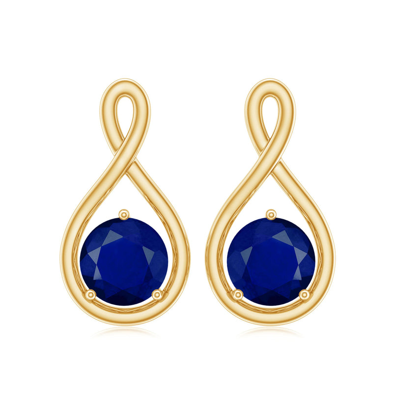 Round cut blue sapphire solitaire infinity stud earrings by Rosec Jewels featuring 3/4 carat blue sapphires and silver settings.