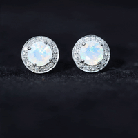 Round Ethiopian opal and diamond halo stud earrings featuring 1.6 carats, set in elegant jewelry design by Rosec Jewels.