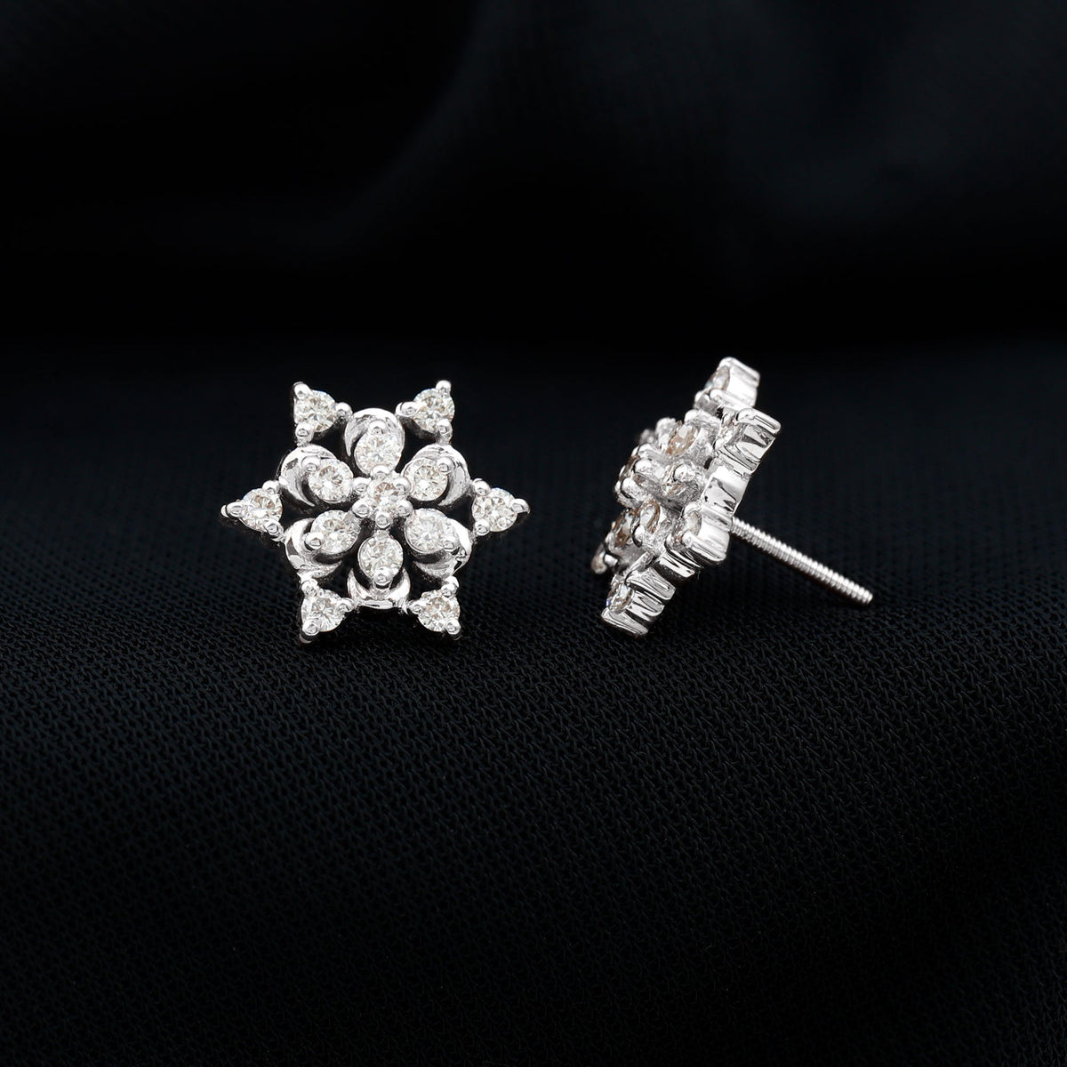 Rosec Jewels certified diamond snowflake stud earrings featuring sparkling diamonds set in a delicate snowflake design.