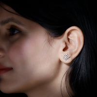 Rosec Jewels certified diamond snowflake stud earrings featuring sparkling diamond accents and intricate snowflake design.