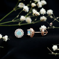 Natural Ethiopian opal and moissanite halo stud earrings by Rosec Jewels featuring vibrant gemstones and elegant metal setting.
