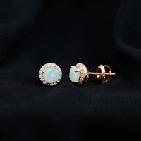 Natural Ethiopian opal and moissanite halo stud earrings by Rosec Jewels featuring sparkling gemstones and elegant design.