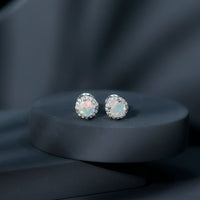 Natural Ethiopian Opal and Moissanite halo stud earrings featuring sparkling gemstones set in elegant earrings design.