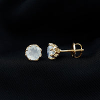 Six millimeter moonstone solitaire stud earrings by Rosec Jewels, featuring elegant and sparkling gemstone settings.
