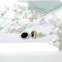 Black onyx oval stud earrings with moissanite halo, featuring 2-carat total weight, from Rosec Jewels.