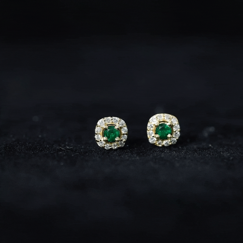 Minimalist emerald and diamond halo stud earrings by Rosec Jewels, featuring green gemstones and sparkling accents.
