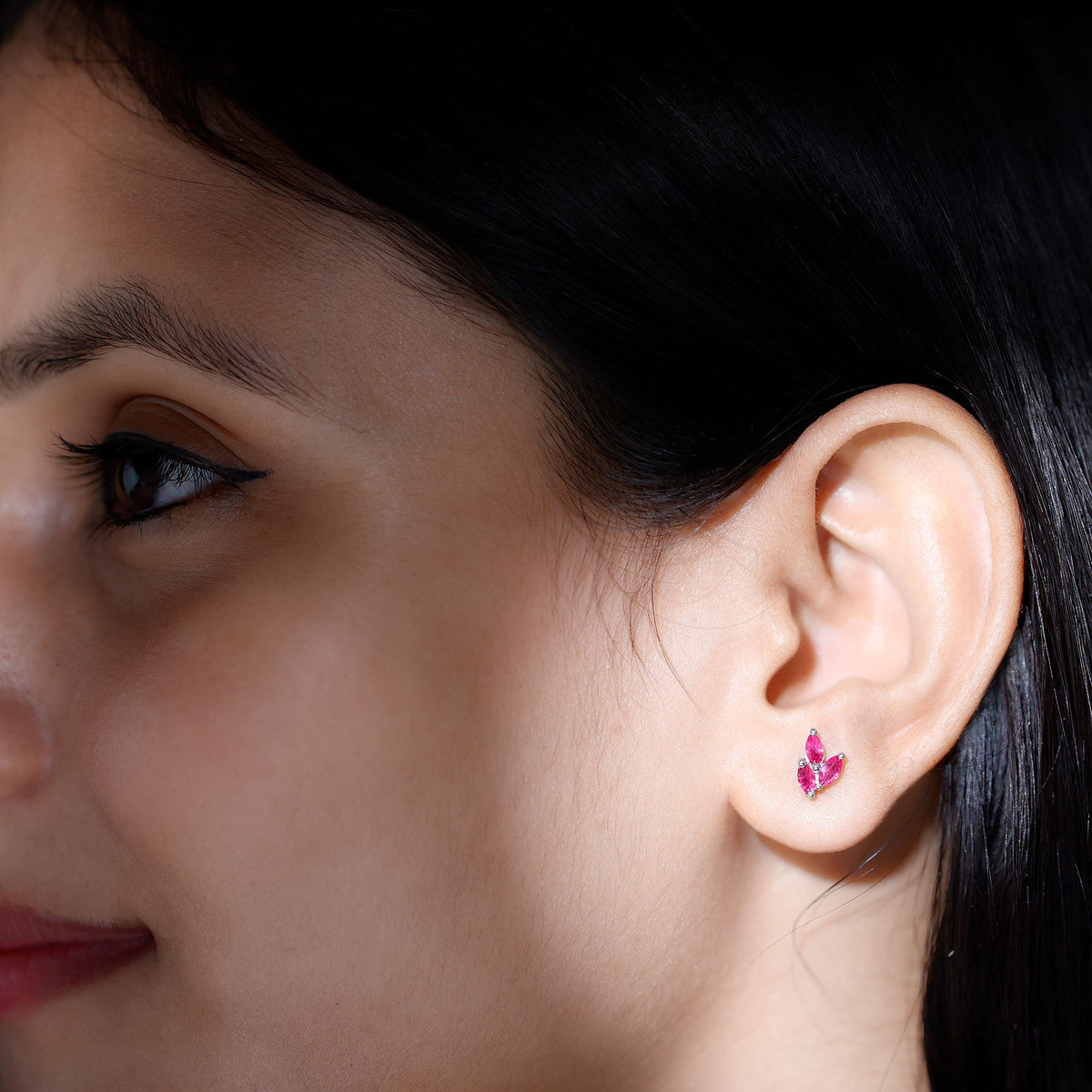 Rosec Jewels marquise-shaped ruby leaf stud earrings for women, featuring vibrant red rubies in a leaf design.