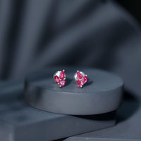 Certified marquise-shaped ruby leaf stud earrings for women by Rosec Jewels, featuring elegant ruby gemstones and leaf design.