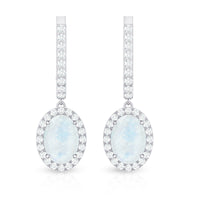 Genuine 1.2 carat oval moonstone drop hoop earrings with diamond accents from Rosec Jewels, featuring elegant jewelry design.