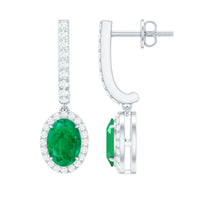 Oval shape emerald hoop earrings with diamond halo, Rosec Jewels earrings featuring green gemstones and sparkling diamond accents.