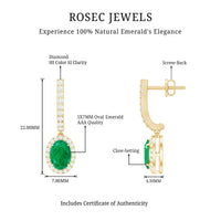Oval emerald hoop earrings with diamond halo from Rosec Jewels, featuring a stylish drop earring design.