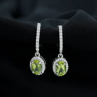 Rosec Jewels 2 Carat Claw Set Peridot and Moissanite Drop Hoop Earrings showing gold hoops with vibrant green peridot and sparkling moissanite stones