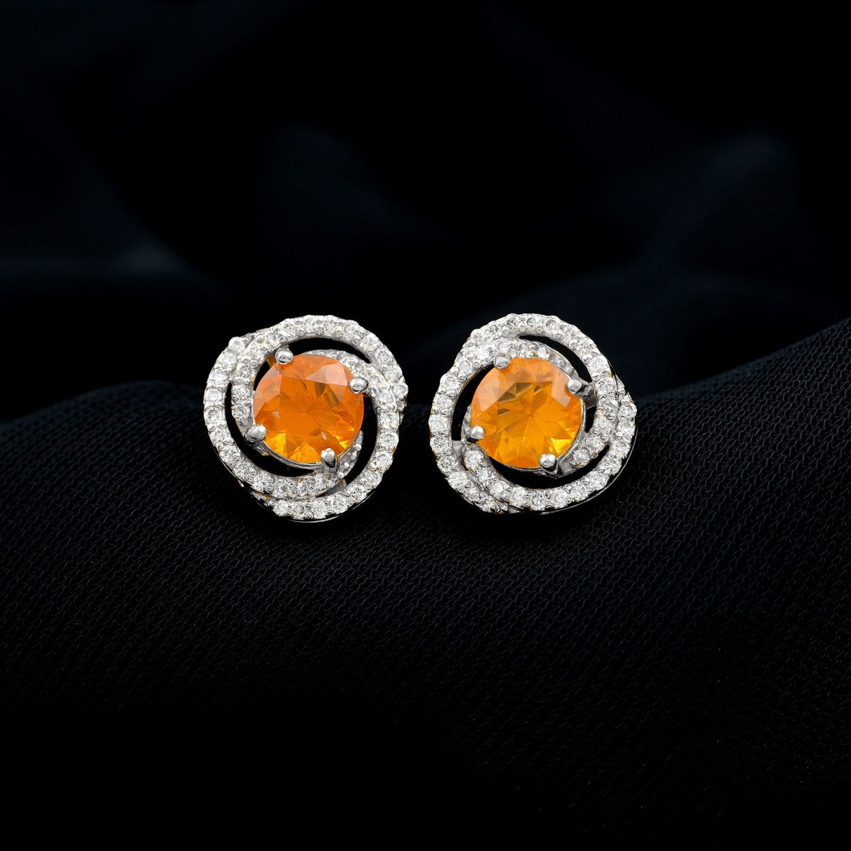 Real fire opal and diamond big stud earrings by Rosec Jewels featuring vibrant fire opals and sparkling diamonds in a bold design.