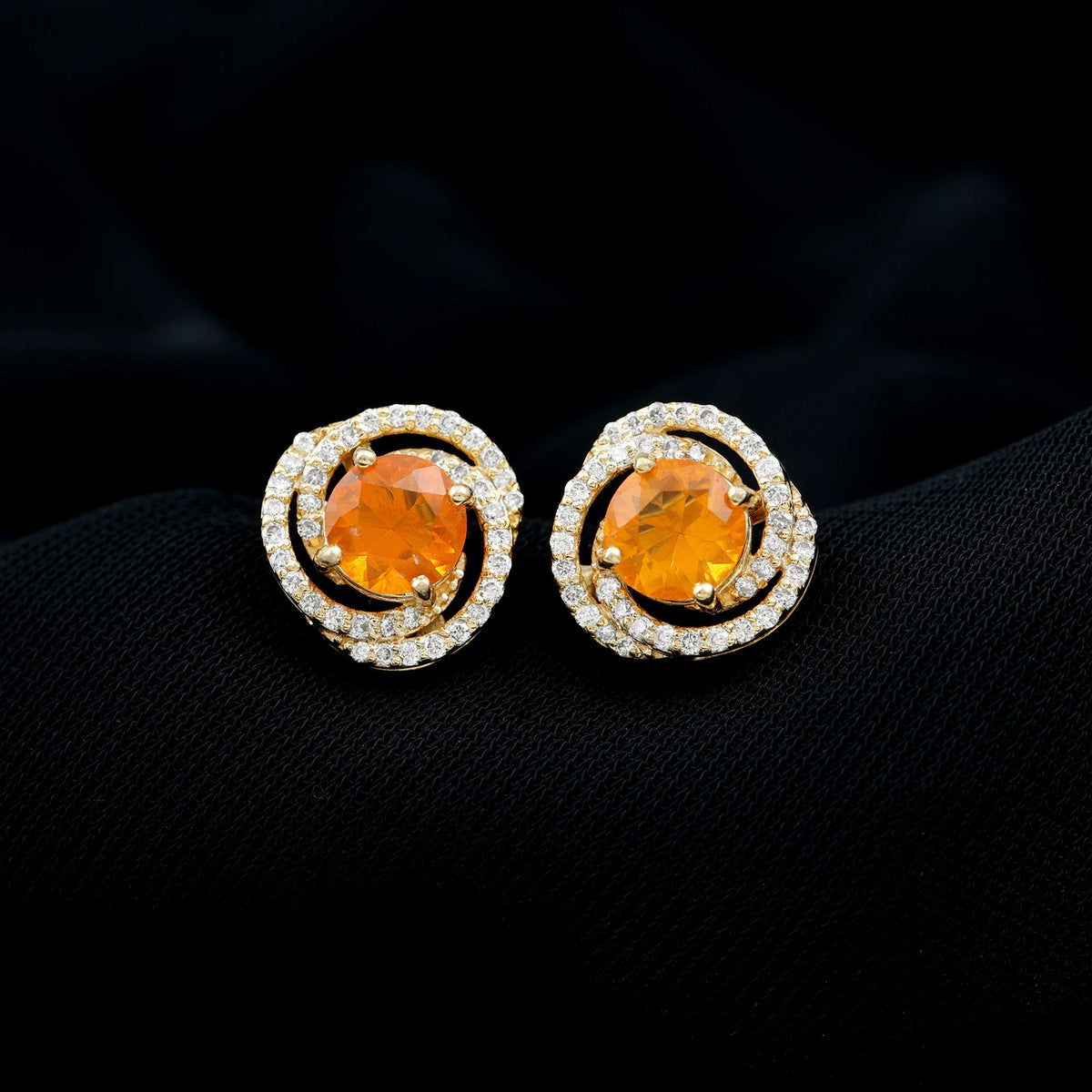 Real fire opal and diamond big stud earrings from Rosec Jewels showing sparkling gemstones set in silver.