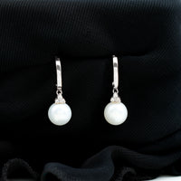 Round freshwater pearl and diamond hoop drop earrings by Rosec Jewels featuring elegant jewelry design.