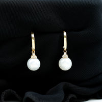 Round freshwater pearl and diamond hoop drop earrings by Rosec Jewels featuring elegant pearl and sparkling diamond accents.