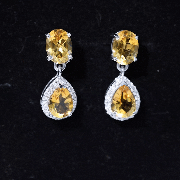 Natural 2 carat citrine and diamond teardrop earrings by Rosec Jewels featuring yellow gemstones and sparkling accents.