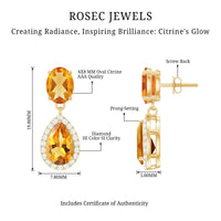 Natural 2 carat citrine and diamond teardrop earrings with gold settings, featuring sparkling gemstones and elegant design.