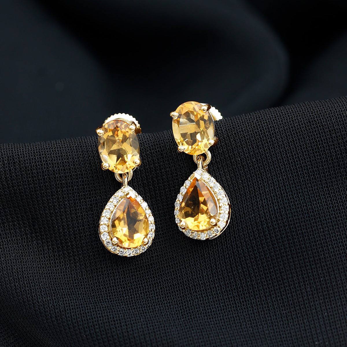 Natural 2 carat citrine and diamond teardrop earrings with gold settings from Rosec Jewels, showcasing elegant jewelry design.