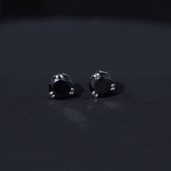 Black Onyx solitaire stud earrings in claw setting by Rosec Jewels, showcasing elegant black gemstone earrings.
