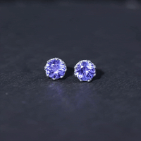 Yellow gold 1 carat Tanzanite stud earrings by Rosec Jewels featuring vibrant, faceted gemstone studs with secure post backs.