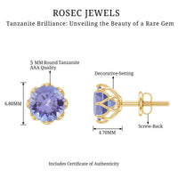 Rosec Jewels 1 Carat Tanzanite stud earrings featuring vibrant blue-purple gemstones with silver posts and backs.