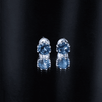 Rosec Jewels 2.7 carat genuine London Blue Topaz solitaire stud earrings with certificate, showcasing vibrant blue gemstones.