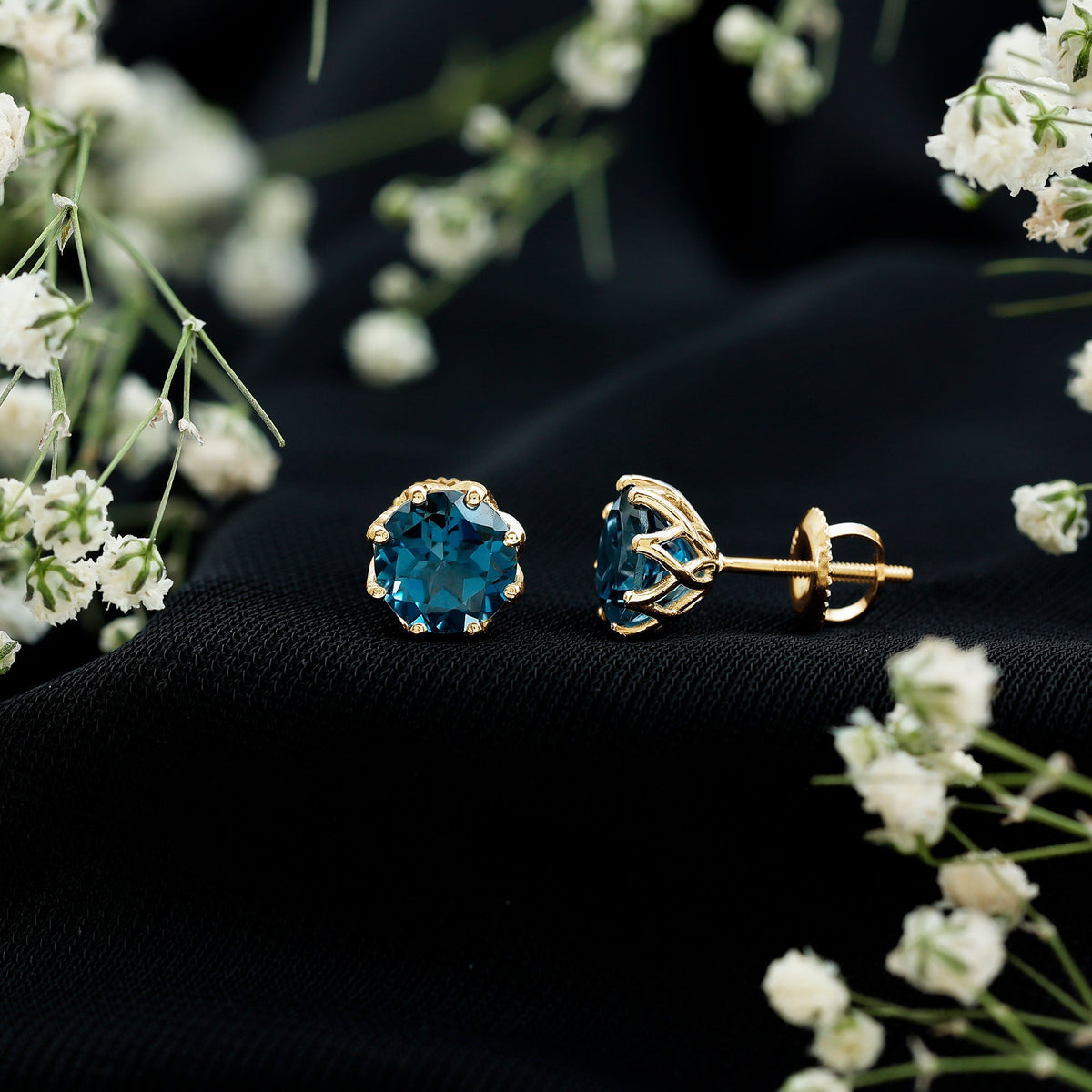 Rosec Jewels 2.7 carat genuine London Blue Topaz solitaire stud earrings with certificate, showcasing the sparkling blue gemstones.
