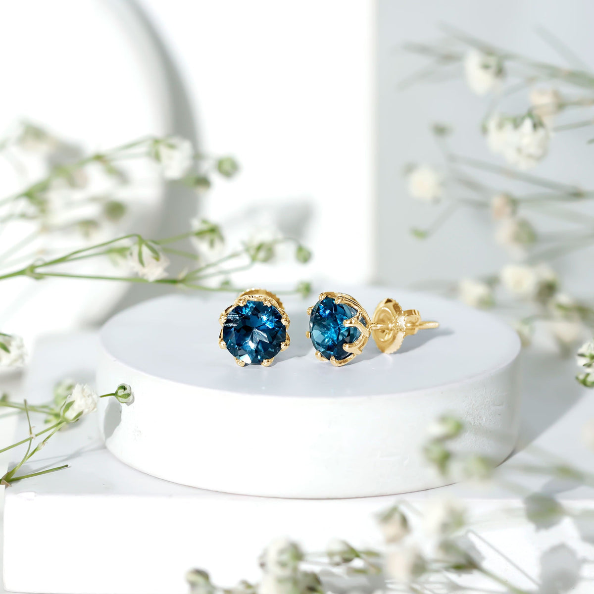 Rosec Jewels 2.7 Carat London Blue Topaz solitaire stud earrings with certificate, showcasing vibrant blue gemstones and elegant design.