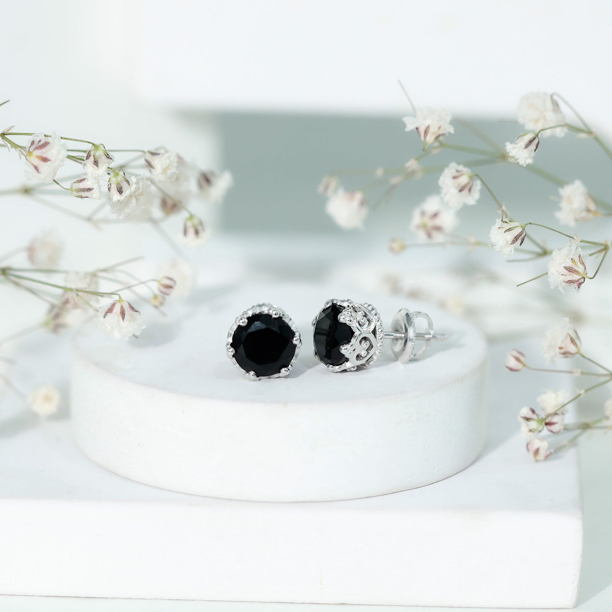 Black spinel crown stud earrings by Rosec Jewels featuring 3 carats of genuine black spinel gemstones in a regal crown design.