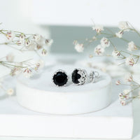 Black spinel crown stud earrings by Rosec Jewels featuring 3 carats of genuine black spinel gemstones in a regal crown design.