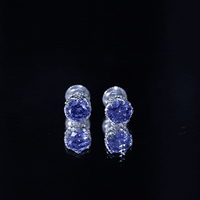 Created blue sapphire solitaire crown stud earrings by Rosec Jewels featuring 2 carats of vivid blue sapphires in elegant setting