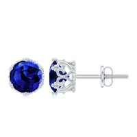 Created blue sapphire solitaire crown stud earrings by Rosec Jewels featuring 2 carats of sparkling blue sapphires in a classic setting.