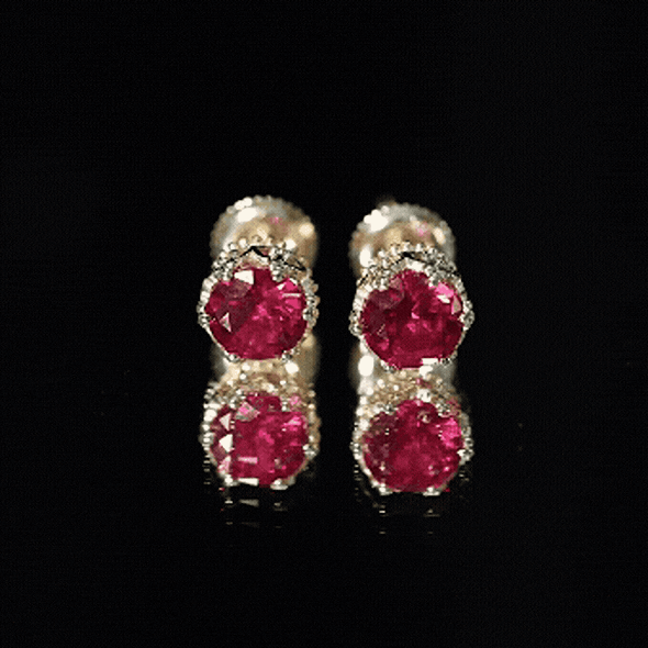 Yellow 2.7 carat lab-created ruby solitaire stud earrings by Rosec Jewels, showcasing vibrant gemstones and classic earring design.