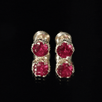 Yellow 2.7 carat lab-created ruby solitaire stud earrings by Rosec Jewels, showcasing vibrant gemstones and classic earring design.