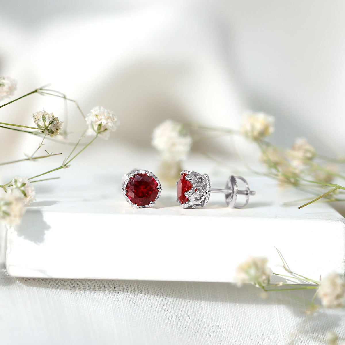 Rosec Jewels 2.7 Carat lab-created ruby solitaire stud earrings with classic design and secure posts.