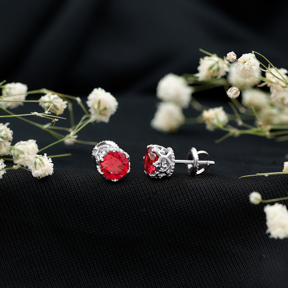 Rosec Jewels 2.7 Carat lab-created ruby solitaire stud earrings, showcasing vibrant red gemstones set in elegant earrings.