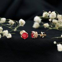 Pair of 2.7 carat lab-created ruby solitaire stud earrings by Rosec Jewels, showcasing vibrant red gemstones in classic setting