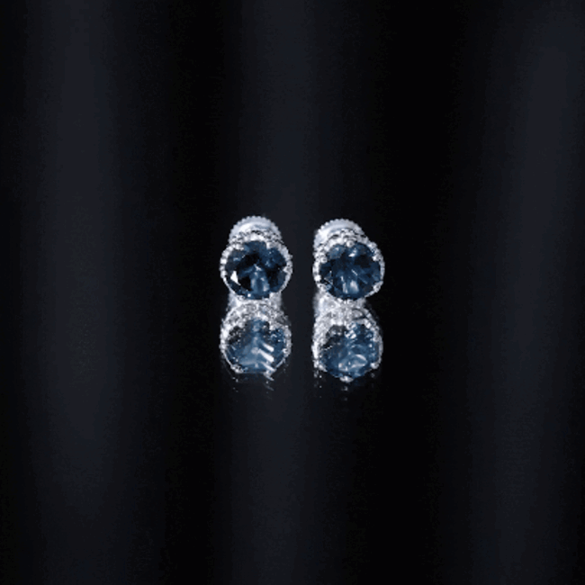 Round cut London Blue Topaz crown stud earrings by Rosec Jewels featuring 2.7 carat blue gemstone in a classic stud design.