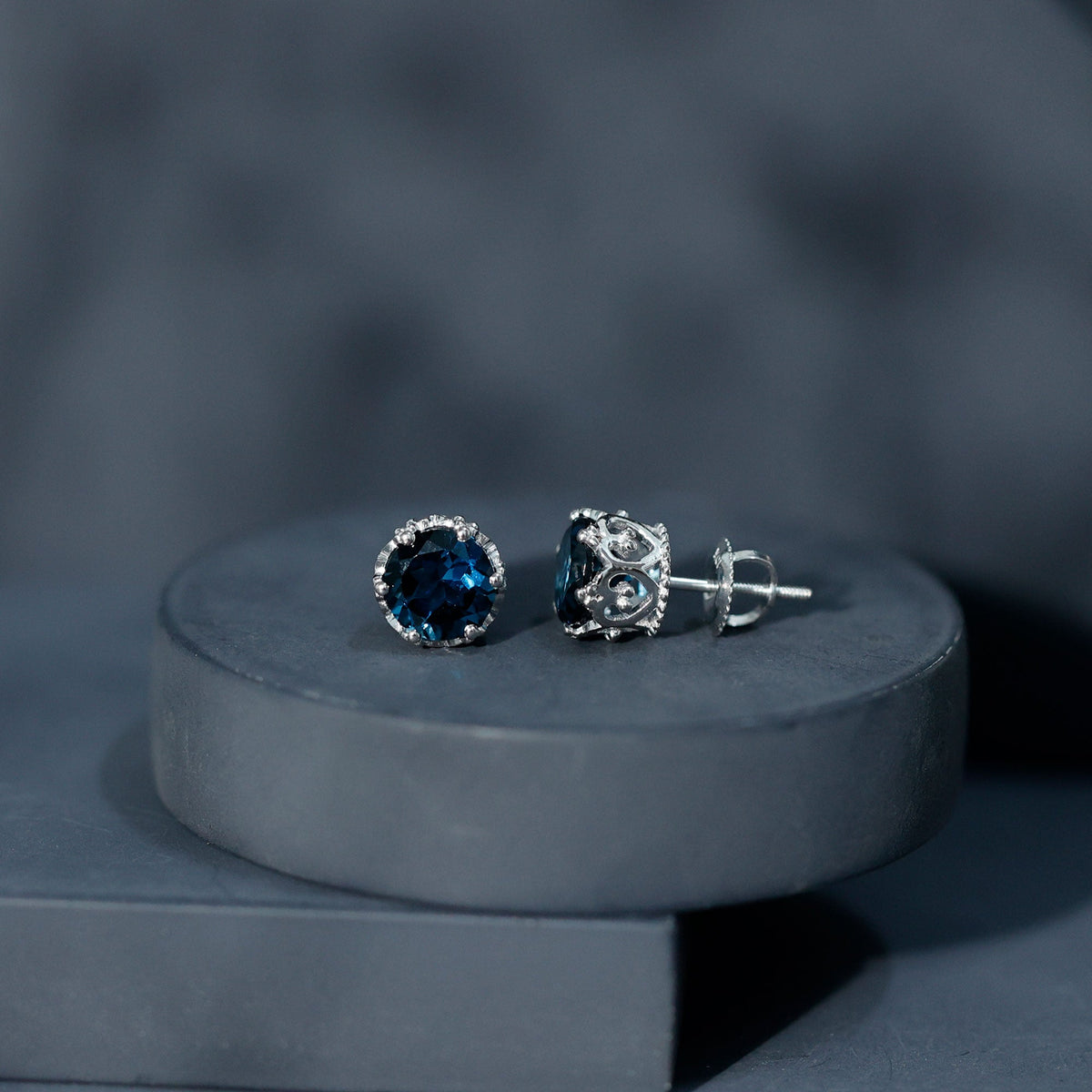 Rosec Jewels 2.7 Carat round cut London Blue Topaz crown stud earrings, showcasing vibrant blue gemstones and elegant design.