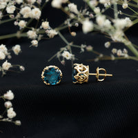Round cut London Blue Topaz crown stud earrings by Rosec Jewels featuring 2.7 carats of vibrant blue gemstone.