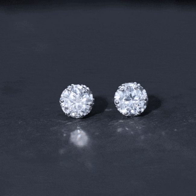 Yellow gold 1.97 carat round moissanite stud earrings in crown setting by Rosec Jewels, showcasing sparkling gemstones.