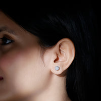Round 1.97 carat Moissanite stud earrings in crown setting by Rosec Jewels, showcasing sparkling elegance and detailed craftsmanship.