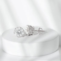 Round 1.97 Carat Moissanite stud earrings in crown setting by Rosec Jewels, showcasing sparkling gemstone and elegant design.