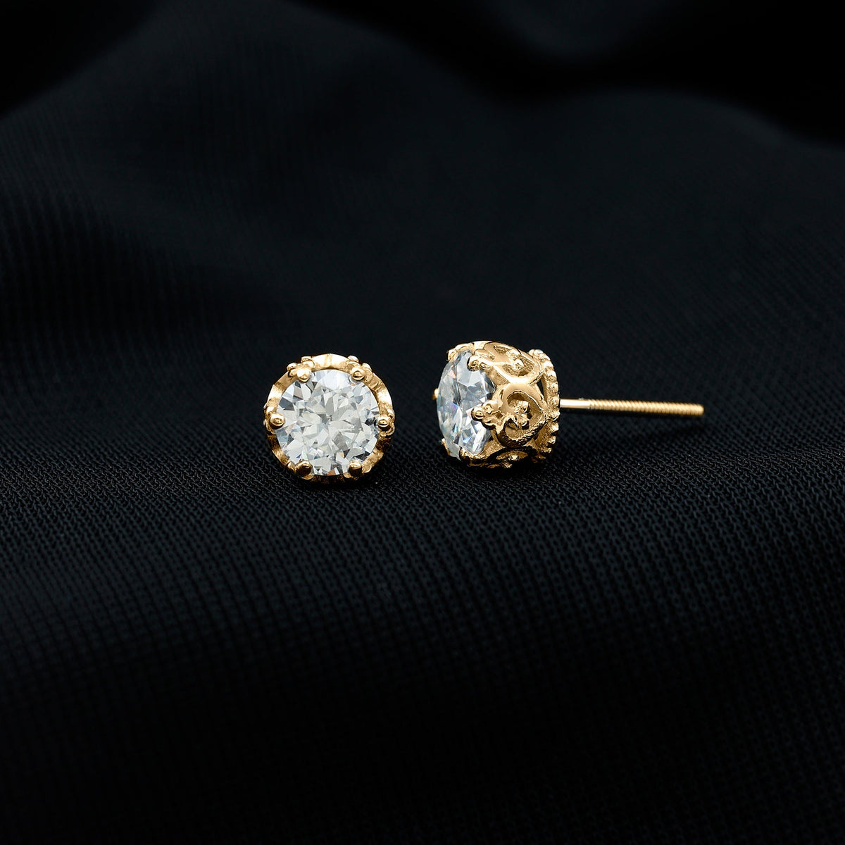 Round 1.97 carat Moissanite stud earrings in crown setting by Rosec Jewels, showcasing sparkling brilliance and elegant design.