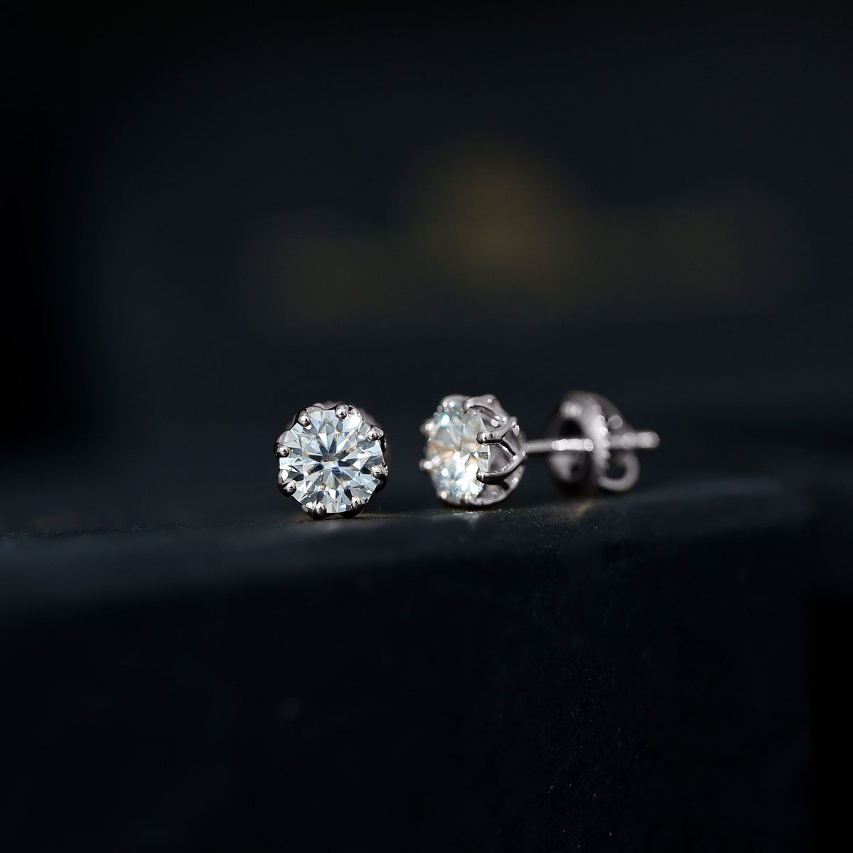 Certified brilliant cut 1.9 carat Moissanite solitaire stud earrings by Rosec Jewels, showcasing sparkling gemstones on classic earrings.