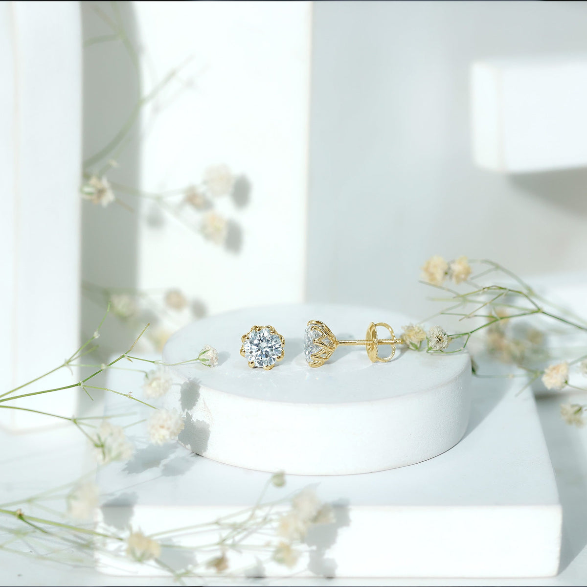Certified brilliant cut 1.9 carat Moissanite solitaire stud earrings by Rosec Jewels, featuring sparkling gemstone set in classic earrings.