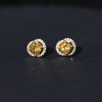 Round citrine and diamond stud earrings by Rosec Jewels featuring yellow gemstones set in a classic earring design.